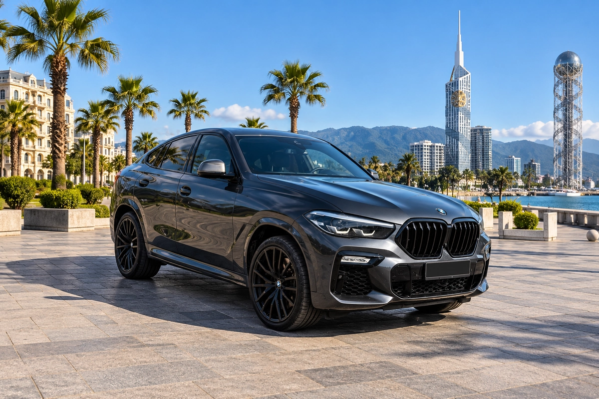 BMW X6 M50i on a city street